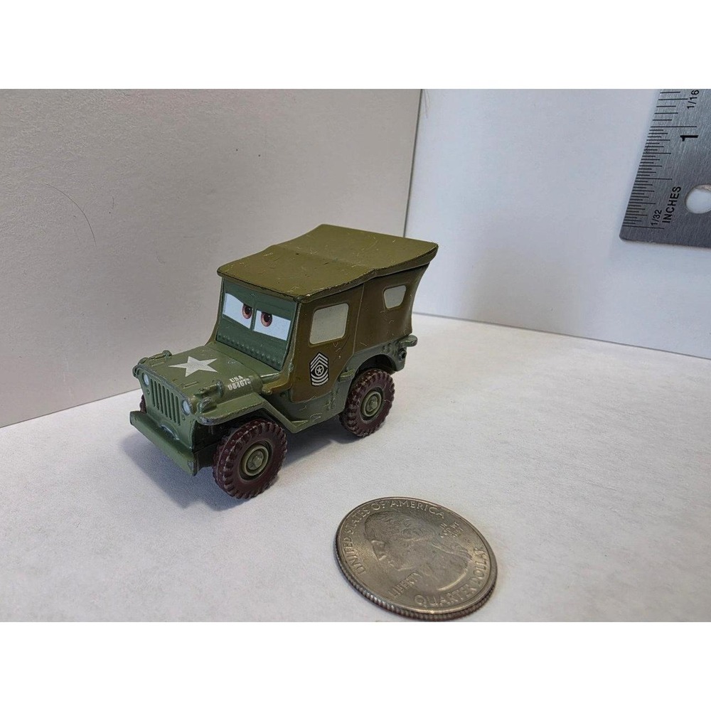 Disney/Pixar Cars Sarge diecast vehicle, specifically from the 1:55 scale Mattel